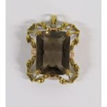 Large pendant 2 tone gold tested as 9ct - mount approx. 3.5cm x 3cm smokey quartz stone 2.5cm x