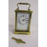 French brass carriage clock marked Paris, with key