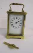 French brass carriage clock marked Paris, with key