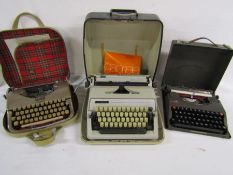 3 vintage typewriters - Oliver Courier, Gabriele 25 and the Baby Empire Deluxe and some typewriter