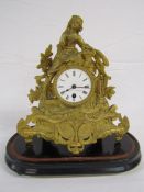 French gilt metal figural mantel clock with wooden stand (af)