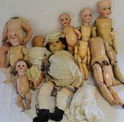 Quantity of composition  / bisque head doll body parts, 3 with Armand Marseille bisque heads, 2 with