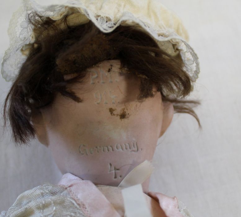 Small bisque head doll marked "UNIS France" on composition straight limb body with fixed eyes, - Image 7 of 12