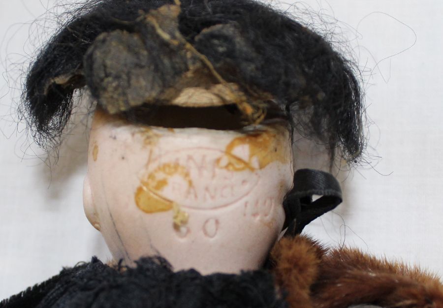 Small bisque head doll marked "UNIS France" on composition straight limb body with fixed eyes, - Image 5 of 12