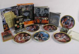 Selection of James Bond ephemera, to include Action Man 007 - Franklin Mint plates some with