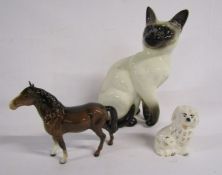 Collection of Beswick includes a broken horse, large Siamese cat 1882 and small Spaniel figurine