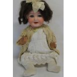 Otto Reinecke bisque socket head doll marked "RM 924 Germany" on bent limb composition body with