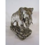 Large early 20th century plaster elephant approx. 17cm x 41cm