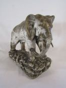 Large early 20th century plaster elephant approx. 17cm x 41cm