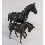 2 leather and papier mache horses - approx. H 47cm large horse - H 28cm small horse