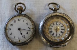 2 Continental silver fob watches with decorative engraving to both cases