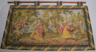 Hanging wall tapestry of an outdoor dancing scene. 105cm by 63cm