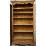 Tall pine bookcase with carved apron 100.5cm wide, 199cm high
