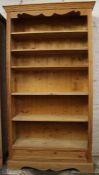 Tall pine bookcase with carved apron 100.5cm wide, 199cm high