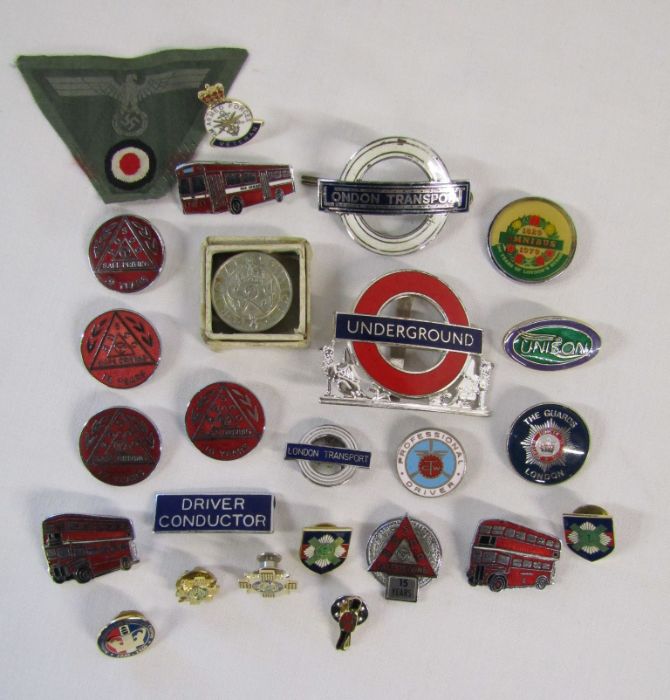 Collection of London underground, London Transport and other badges and pins, long service badges