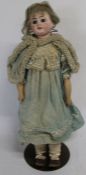 Bisque shoulder head doll marked 1894 A M 6 DEP (damaged) on kid and composition body with fixed