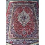 Rich red ground full pile cashmere traditional carpet with medallion 195cm by 135cm