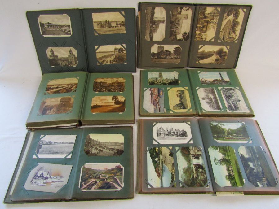 Collection of vintage postcard albums with postcards, mainly topographical, mostly written on, the