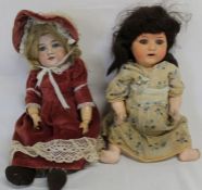 2 Armand Marseille bisque socket head dolls marked "A 3 M" on straight limb composition body with