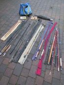 Selection of fishing rods and fishing bag