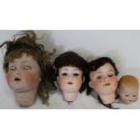 4 bisque socket dolls heads:- K R Simon & Halbig 117 Germany 80 with sleeping eyes & open mouth,