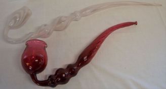 Two 19th century blown glass pipes, one with a crack