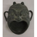Small bronze Chinese demon's head 10cm by 10cm. Provenance: vendor advises they were gifted the item