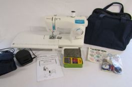 Toyota electric sewing machine model - SPB15 in carry case with extension table and instruction