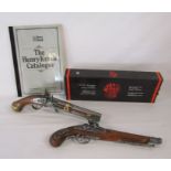 2 replica flintlock pistols and The Henry Krank catalogue