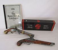 2 replica flintlock pistols and The Henry Krank catalogue