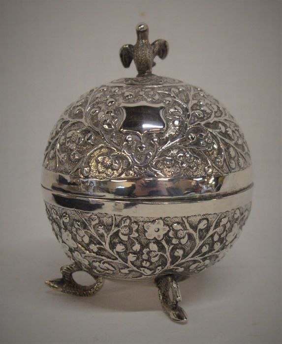 Spherical Anglo Indian white metal pot with repousse decoration & bird finial Ht 12cm