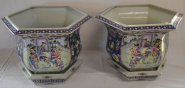 Pair of modern Chinese octagonal porcelain planters on bases Ht 29cm (one base with hole)