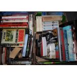2 boxes of books on military history including "Jane's Fighting Aircraft of WWII" & "Liddell Hart'