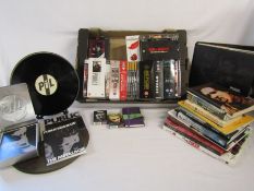 Mixed Rock/Punk selection of items to include PIL Public Image Limited records and cds, books to