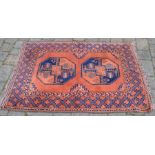 Pakistani red ground rug 138cm by 99cm