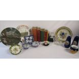 Collection of items to include nursing books, Mats Jonasson glass block with otter, Magna Carta