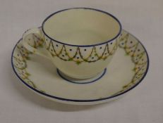Pinxton bute shape tea cup & saucer decorated with swags & a blue border