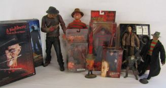 Collection of Freddie Kruger figures and a Jason figure