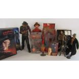 Collection of Freddie Kruger figures and a Jason figure