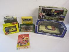 Collection of toy cars to include Munsters Koach 1:18 scale, Anson 1973 Cadillac Eldorado 1:18