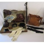 Vintage suitcase and contents to include leather dress gloves, leather ice skates by W.Abbott &