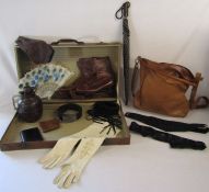 Vintage suitcase and contents to include leather dress gloves, leather ice skates by W.Abbott &