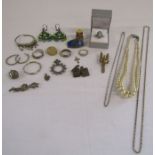 Collection of costume jewellery to include a silver badge and Wedgwood ring