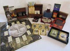 Collection of tarot cards, runes and stones to include Daemon Tarot, Deviant Moon Tarot, Thoth Tarot