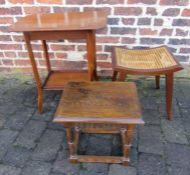 2 small tables and a wicker seated stool