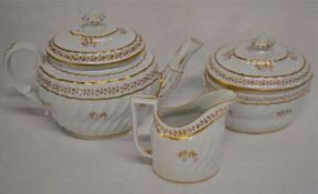 Late 18th century porcelain tea set comprising teapot marked N248, sucrier & milk jug