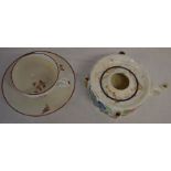 Possibly by Pinxton a bute shape teacup & saucer & inkwell with some restoration