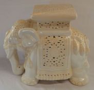 Ivory colour ceramic elephant stand. Ht 46cm