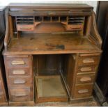 Early 20th century oak tambour front desk