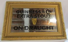 Wall mirror with Guinness artwork applied approx. 74.5cm x 49cm (includes frame)